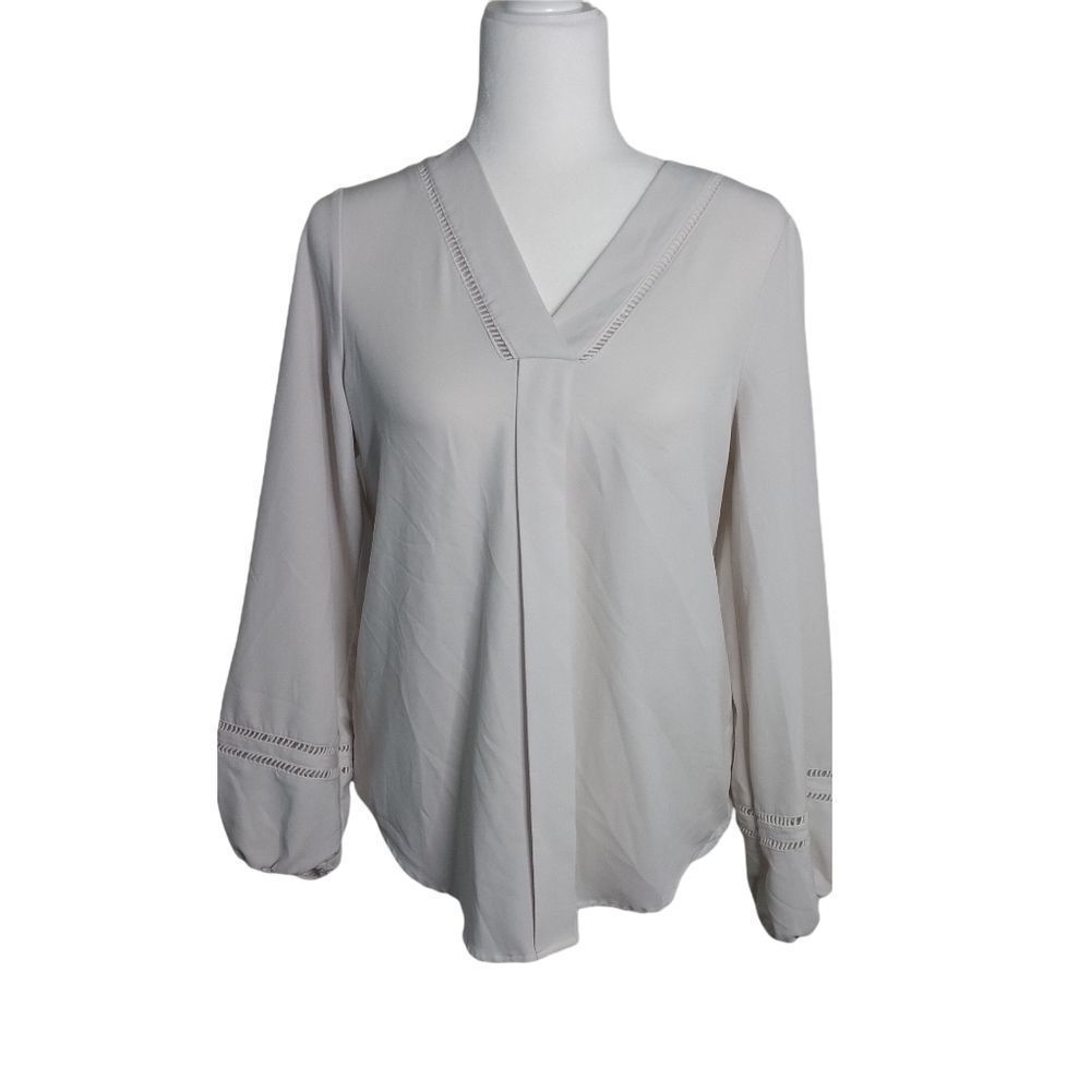 Cupio All White Long Sleeve with Elastic Hems around the wrist detail.